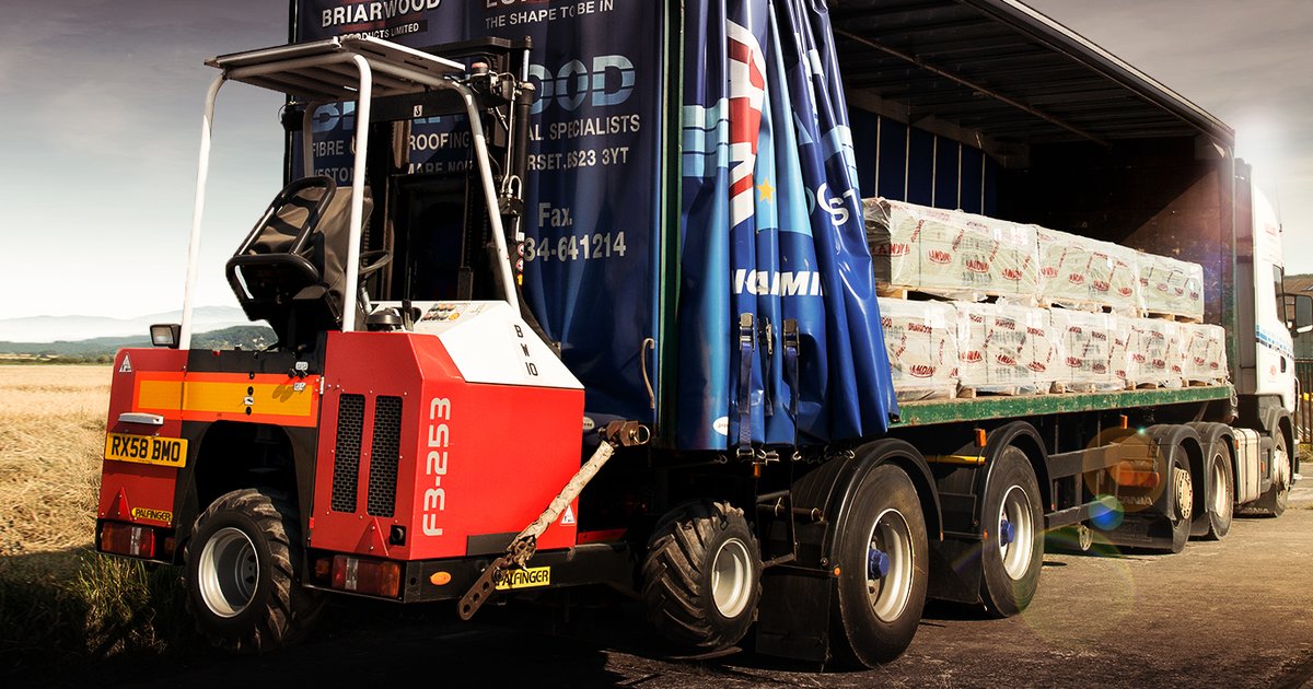 Truck-mounted rider transportable forklift on a delivery vehicle